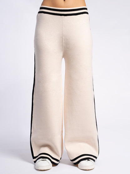 Pantalone in maglia con piping