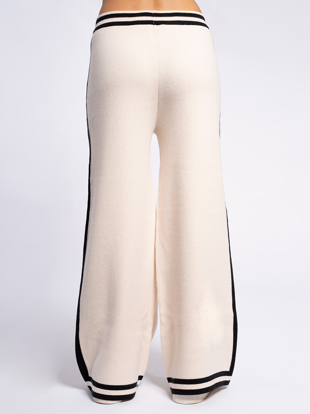 Pantalone in maglia con piping