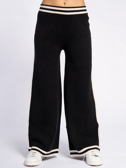 Pantalone in maglia con piping