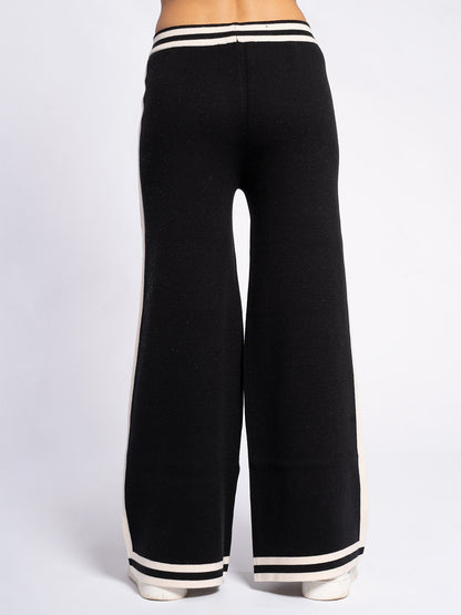 Pantalone in maglia con piping