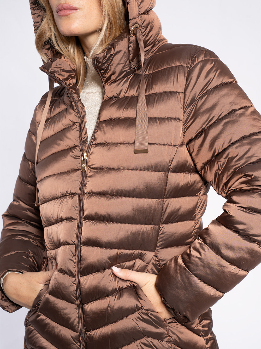 Piumino comfort con cappuccio staccabile