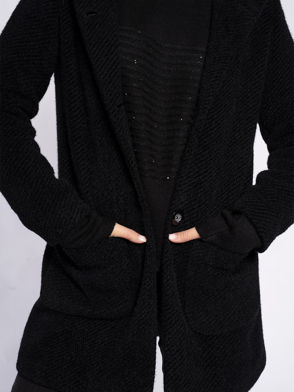 Cappotto in maglia con cappuccio