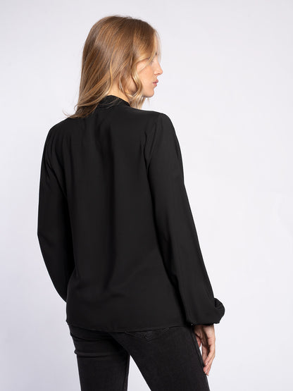 Blusa con pendaglio