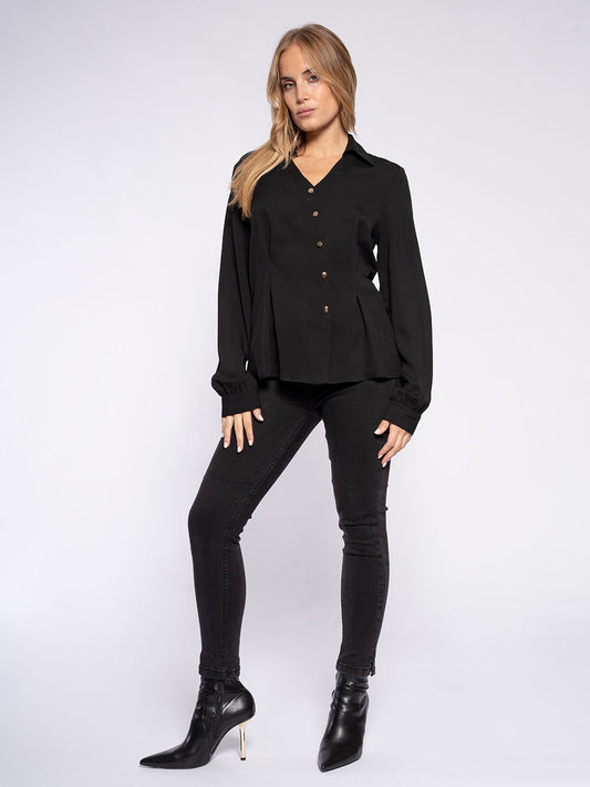 Blusa con bottoni