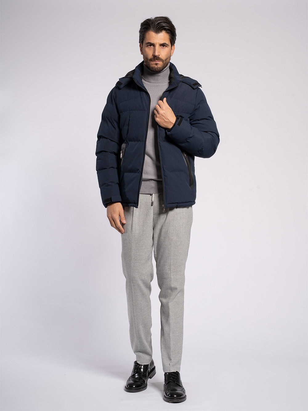 Piumino con cappuccio staccabile