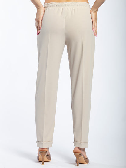 Pantalone elastico con fiocco in vita